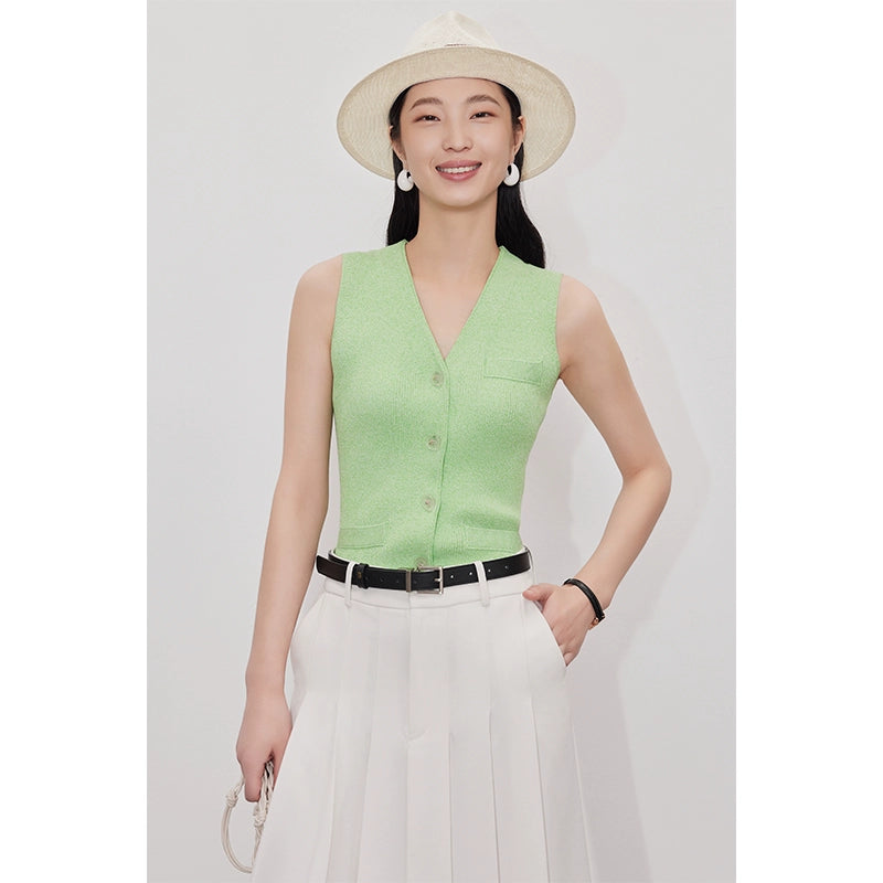 A short knit vest layered for women, a small canvas shoulder wrap with a V-neck, a very simple collared sleeveless jacket 