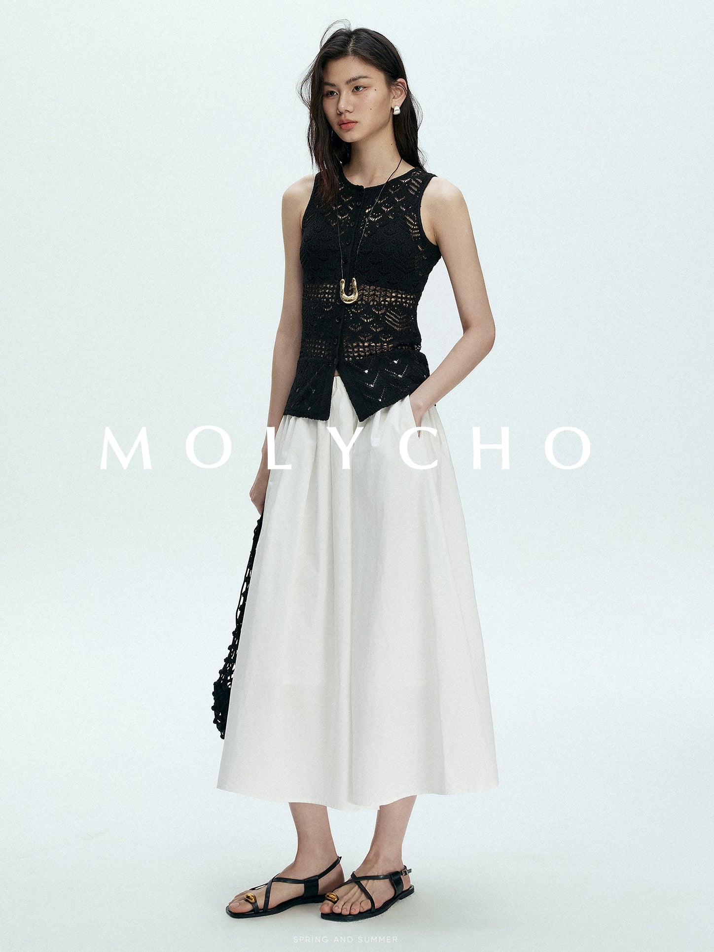 Knitted Hollow Sleeveless Tops_BDHL7433