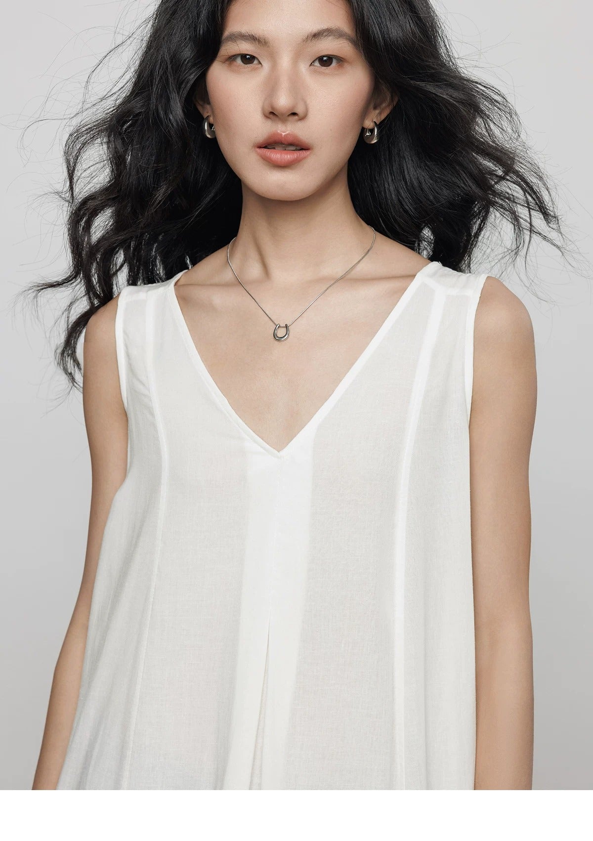 Ruffle Hem Sleeveless Linen Top_BDHL8360