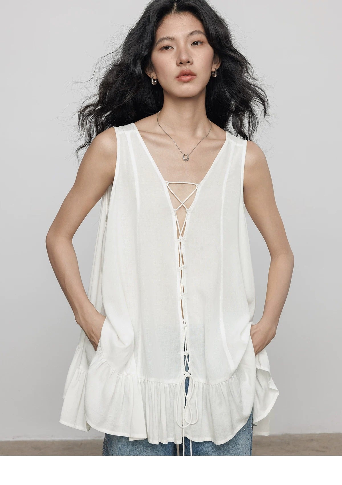 Ruffle Hem Sleeveless Linen Top_BDHL8360