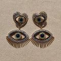Eye motif stud earrings HL9707