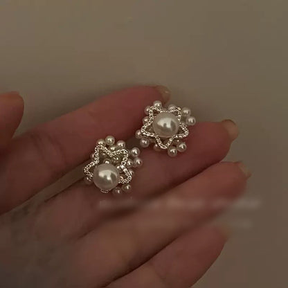 Pearl star earrings 8826
