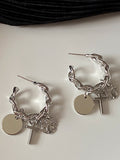 cross motif earrings 8931
