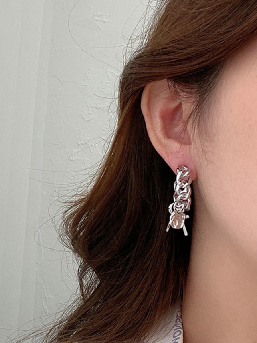 cross motif earrings 8931