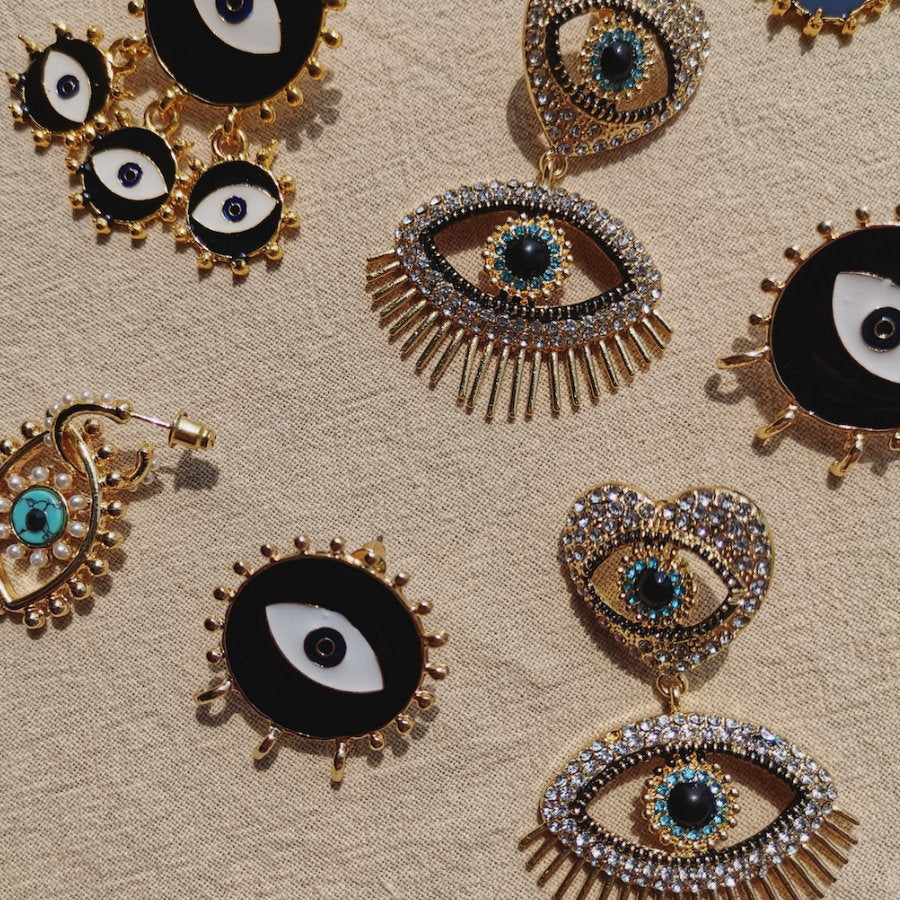 Eye motif stud earrings HL9707